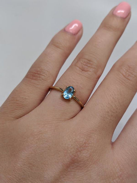 Solitaire Blue Topaz Ring